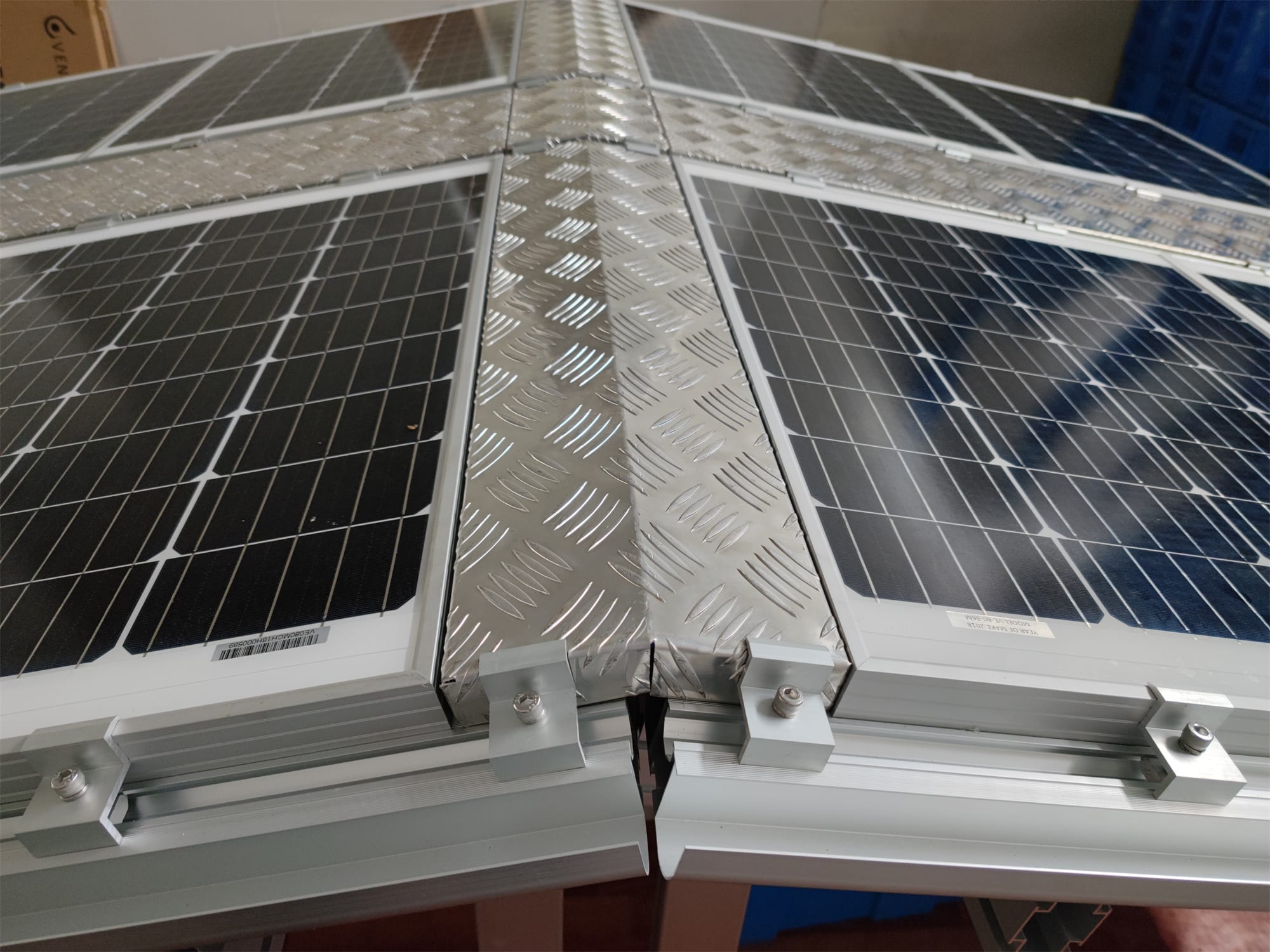 BIPV walkway and panel joint installation