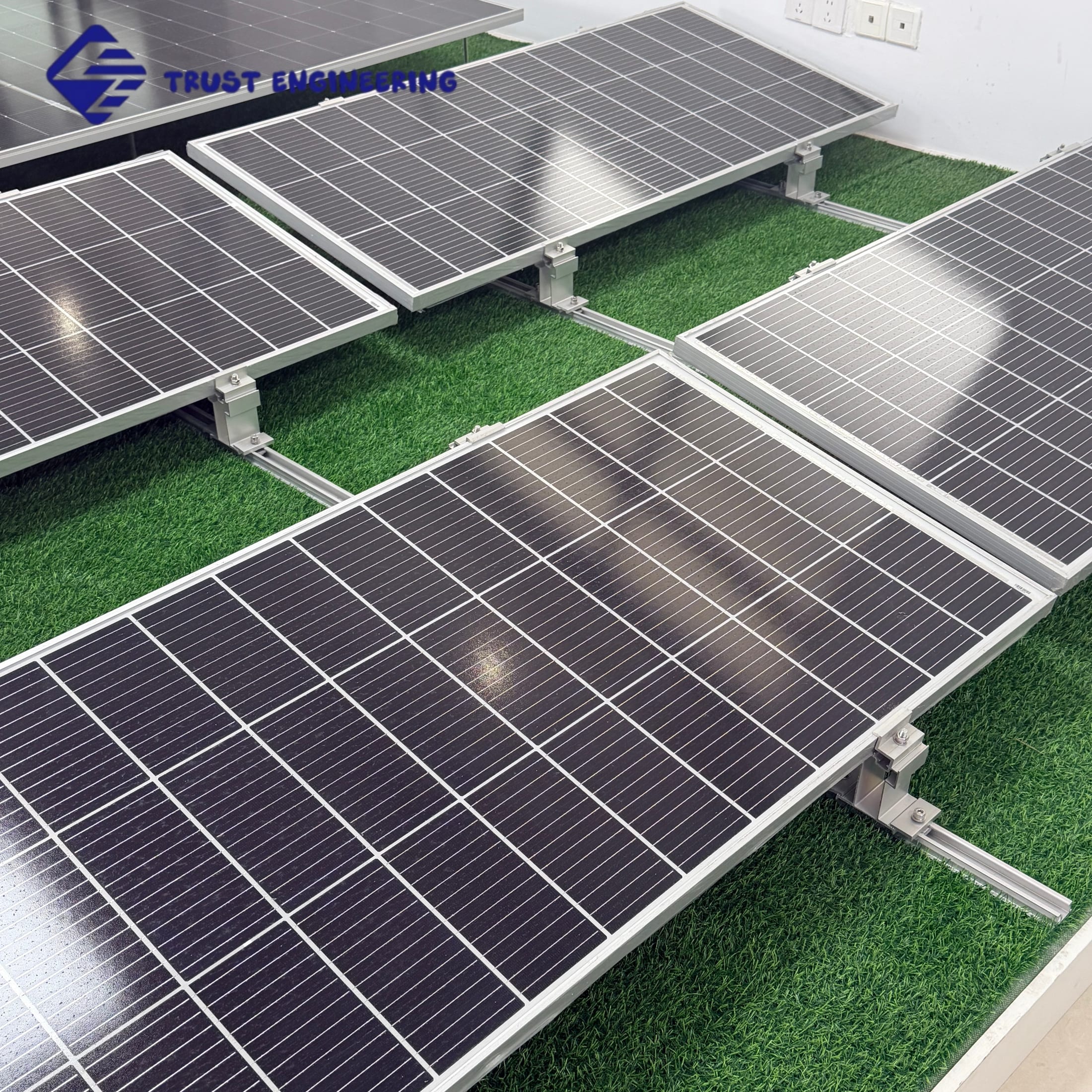 Flat roof solar mounting system on artificial grass display
