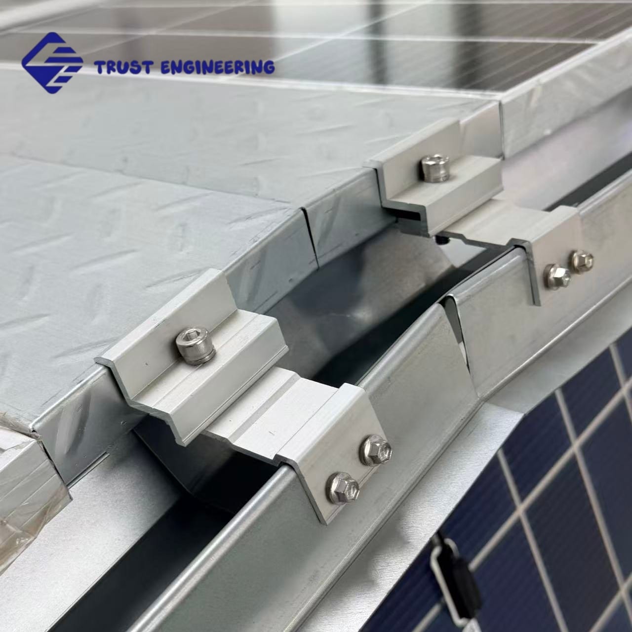 Mid clamp close-up on metal roof solar panel